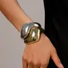 Pulsera geométrica irregular de superficie lisa de metal estilo europeo y americano, personalidad, simple, nicho, temperamento, joyería de alta gama para mujeres