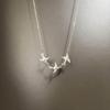 Collar de golondrina sinsonte de plata esterlina S925, cadena de clavícula con grupo de pájaros, cadena de cuello de pájaro elegante y de personalidad simple para mujer