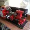 Suministro Jingxing control de velocidad continuo torno C2 torno CJ9518 mesa de torno máquina herramienta pequeña para enseñanza investigación y desarrollo