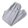 Pantalones deportivos de otoño para hombre, pantalones casuales, transpirables, para correr, de punto, con bolsillo y cremallera