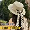 Sombrero de paja de protección solar de verano para mujer, estilo francés con tiras de perlas, ala ancha, sombrero de sol con lazo para la playa y la costa, moderno