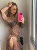 Vestido cruzado europeo y americano para mujer 2024 nuevo de cuello redondo manga larga de malla estampada con abertura para mujer vacaciones de playa al por mayor