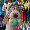 Bolsa de monedas popular de Capibara Llavero Cabeza de silicona Bolsa de almacenamiento para auriculares Bolso colgante Accesorios Regalos pequeños Al por mayor
