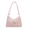 La popular bolsa de mano para dumplings de estilo fresco de este año para mujer, nuevo modelo de otoño 2026, elegante bolso de hombro con lazo, bolso de moda para el antebrazo