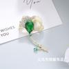 Broche de hoja de ginkgo de alta calidad estilo nacional nuevo, jade verde imitación elegante, accesorios para broche de cheongsam, pin anti-corrida al por mayor