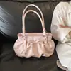 Bolso de cubo plisado elegante de mano para mujer 2026 verano nuevo bolso casual simple de un solo hombro versión coreana sensación de alta gama bolso de mujer