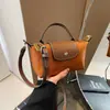 Moda Retro Versátil Transfronterizo Explosiones 2025 Nuevo Bolso de Mujer Hombro Cruzado Portátil a Mano Nylon de Gama Alta Bolso Dumpling