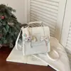 Mochila Estilo Coreano com Laço para Mulheres 2026 Nova Estilosa Estilo College Mochila de Menina Bolsa Transversal Ombro Texturizada