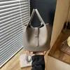 Bolso pequeño súper popular para el trabajo, nuevo bolso de hombro para mujer 2026 otoño nicho para ir al trabajo, bolso bandolera tipo cubo