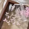 Accesorios de moño para decoración de uñas transparentes tallados suavemente, populares en Xiaohongshu, decoraciones de moño de cinta impresas esmeriladas para uñas