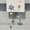 Aretes largos de borla de copo de nieve azul hielo 2025 nuevo diseño de otoño e invierno asimétrico nicho senior temperamento