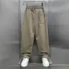 Pantalones Casuales Nuevos de Estilo Scimitar para Hombre Primavera y Otoño 2025 Estilo Coreano de Moda Sueltos Pierna Recta Parches Marca de Moda Pantalones Deportivos para Hombre