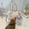 Bolsa Boston Pillow Feminina 2026 Primavera Nova Bolsa de Mão Moda para o Trabalho Estampa de Desenho Animado Ombro Único Transversal