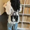 Bolso de mano de nicho para mujer 2026 nuevo de moda primavera alto valor para el trabajo bandolera tipo cubo bolso de hombro casual