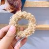 Cuerda de pelo de cordero Dongdaemun coreana para otoño e invierno, anillo de pelo de felpa de color caramelo, cuerda de pelo rizado, tendón de goma, accesorios para el cabello