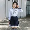 Traje de uniforme escolar estilo preppy británico uniforme escolar estudiante de secundaria camisa jk falda plisada disfraz para actuación de coro fábrica venta al por mayor