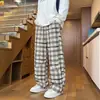 Pantalones casuales de pana a cuadros americanos deconstruidos para hombre de otoño, corte holgado estilo coreano, pantalones versátiles de largo completo para hombres y adolescentes