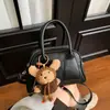 Bolsa de Mão Versátil da Moda Bolsa Bowling para Mulheres 2026 Nova Moda Início da Primavera Bolsa Almofada Coreana Bolsa de Ombro Transversal Estilosa