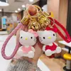Lindo Llavero de Nudo de Lazo Gato Kt Figura de Resina Hello Kitty Colgante de Cuerda Trenzada Encanto Versátil de Bolsa de Dibujos Animados