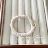 Moda simples alta elasticidade fofo cabeça de bola intestino fino elástico de cabelo adorno de cabeça elástico feminino corda de cabelo para amarrar cabelo corda de cabelo durável