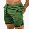 Cross-border Muscle Fitness Masculino Shorts Esportivos Malha Fina Quick-drying Casual Running Training Respirável Calças de praia respiráveis