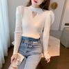 Moderna Malha Outono e Inverno Transfronteiriça Novo Estilo com Tops Vazados de Manga Comprida para Mulheres com Design Cava Manga Bufante Camisetas Básicas