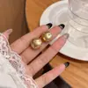 Aretes Florales Frescos y Delicados para Mujer, Suaves y Elegantes, Aretes Tipo Bobina de Mosquitos Sin Perforación, Lujo Ligero con un Toque de Alta Gama, Aretes de Flor de Lirio