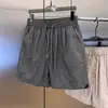 Nuevos shorts casuales deportivos de malla transpirable para hombre de verano, sueltos, cintura elástica, moda moderna para hombre