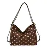 Bolso de mano de moda retro de lunares para mujer, nuevo bolso versátil de gran capacidad para el otoño e invierno de 2026, para ir al trabajo, de hombro y cruzado