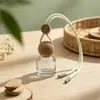 Botella de perfume para coche, colgante de cristal esmerilado vacío, botella colgante de perfume para coche, botella de recarga de aceites esenciales, colgante para coche al por mayor