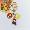 Llavero Creativo de Mario Clásico de la Infancia Hongo Rojo Colgante de Super Mario Encanto de Dibujos Animados para AirPods