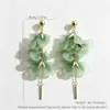 Pendientes de borla de pétalos de malla con degradado verde para mujer, estilo largo de alta gama, delicados, modernos, versátiles, pendientes estilo vacación en la playa