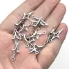 Accesorios de joyería de aleación con forma de estrella y cruz retro transfronteriza, pendientes, collar y colgante.