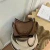 Bolsa vintage de grande capacidade para mulheres, novo modelo 2026, bolsa transversal casual versátil para cross-border, bolsa de ombro e axila super popular