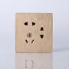 Panel de enchufe y interruptor de pared oculto personalizado H23 dorado cepillado para el hogar panel de 3 orificios 5 orificios enchufe multiorificio personalizado