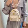 Mochila de un solo hombro cruzada de dibujos animados nueva 2026 versátil nicho correa doble para el hombro bolso de mano de moda para mujer otoño simple