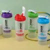 Vaso agitador de proteína de 500 ml de tres capas con escala, rejilla de resorte, compartimento para polvo, vaso deportivo, vaso agitador para beber directamente en el gimnasio
