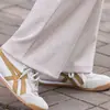 Conjunto esportivo moderno para mulheres 2026 primavera e outono novo conjunto estiloso que rejuvenesce para mães de meia-idade e idosas, roupa casual para corrida que emagrece