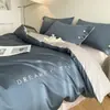 Juego de ropa de cama de lujo de cuatro piezas de algodón de fibra larga de 80 hilos, sábana bajera 100% algodón, funda de edredón bordada, juego de tres piezas de alta gama