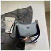 Bolso de axila de mezclilla muy elegante y único para mujer, nuevo bolso cruzado versátil de moda 2026, bolso de mano pequeño chic para salir