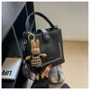 Bolso Retro de Gama Alta para Mujer 2025 Nuevo Estilo Coreano Moda Bolso de Hombro Único Bolso Cruzado Diseño de Nicho Bolso de Mensajero Bolso Cubo