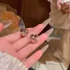 Estilo Caliente 2025 Aretes de Corazón Súper Brillantes y Elásticos para Rostro para Mujeres, Lujo Accesible Pendientes y Aretes de Nicho de Gama Alta