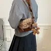Bolsa xadrez estilo japonês Ursinho, uma bolsa transversal, de ombro e sela elegante e versátil para mulheres, adequada para o trabalho e uso casual, nova coleção 2026