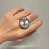 Puede ir a ver la tendencia del anillo en la versión coreana de los accesorios de moda retro personalidad reloj anillo anillo pulsera hombres
