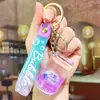 Llavero de botella de bebida acrílica rellena de líquido, botella de refresco con cuentas de burbujas líquidas, botella de cola, colgante de lata grande fácil de abrir