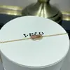 Aretes de oro de 18 quilates de Fred incrustados con diamantes con diseño de nudo doble y elegante collar con borla en forma de pera, un toque de lujo y moda