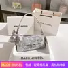 Una generación de nuevo bolso baguette bordado estilo chino 2024 bolso de axila de nicho para el día a día al por mayor