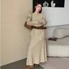 Conjunto de Dos Piezas de Punto Holgado de Cuello Redondo Estilo Coreano Otoño/Invierno 2025 Conjunto de Falda Larga con Hombro Inclinado de Alta Gama para Mujer