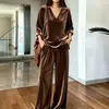 Colección de otoño/invierno 2026 europea y americana transfronteriza: Elegante conjunto de otoño estilo coreano para mujer, con un top de cuello en V y pantalones de pierna ancha, un conjunto de dos piezas