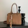 Bolso de Mano de Alta Gama para Mujer 2026 Nuevo de Moda Otoño Vintage Bolso Cubo para el Trabajo Versátil Bolso de Hombro Cruzado